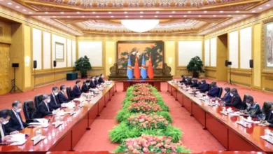 Xi