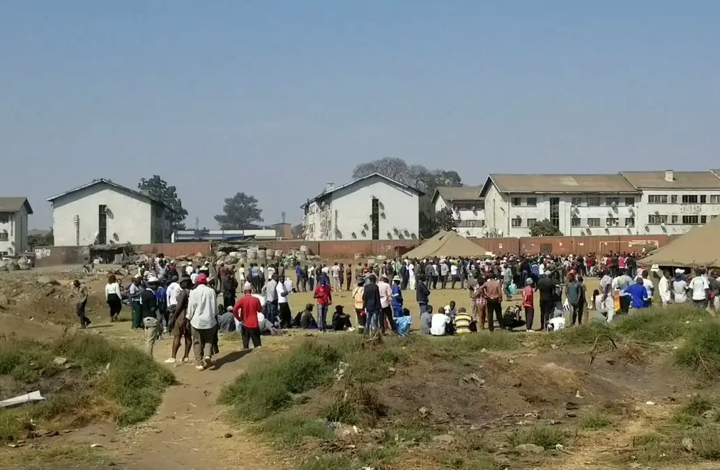 Long queues across Zimbabwe as polling stations open in tightly-contested elections