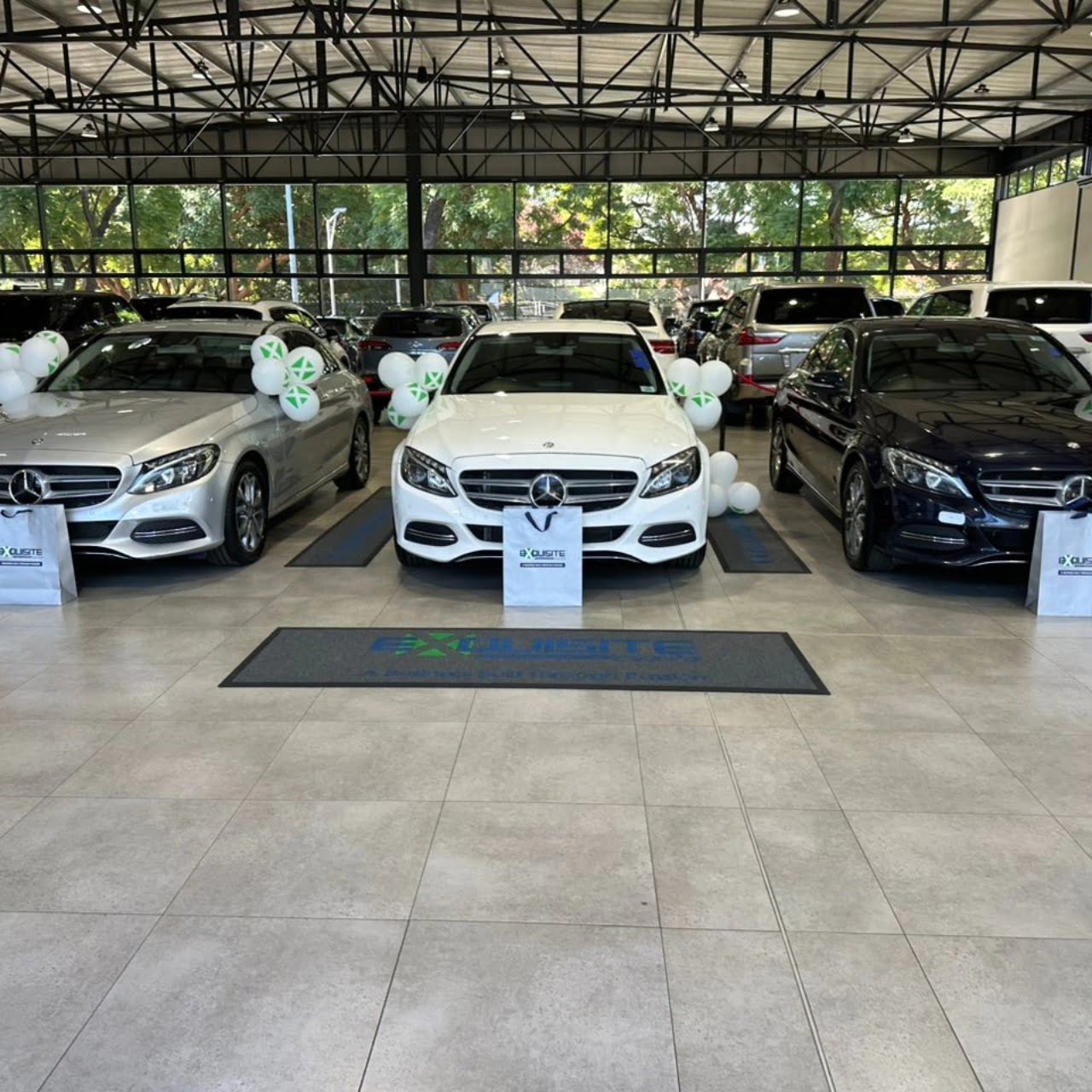 Sir Wicknell blesses Diana Samkange, Mathias Mhere & Andy Muridzo with Mercedes Benz C Classes