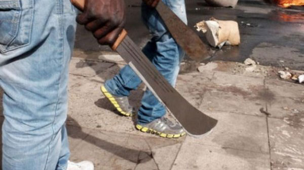 Machete-wielding touts